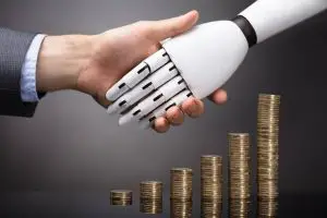 Businessperson And Robo investment shaking hands